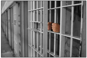 hands jail cell