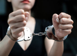 woman in handcuffs